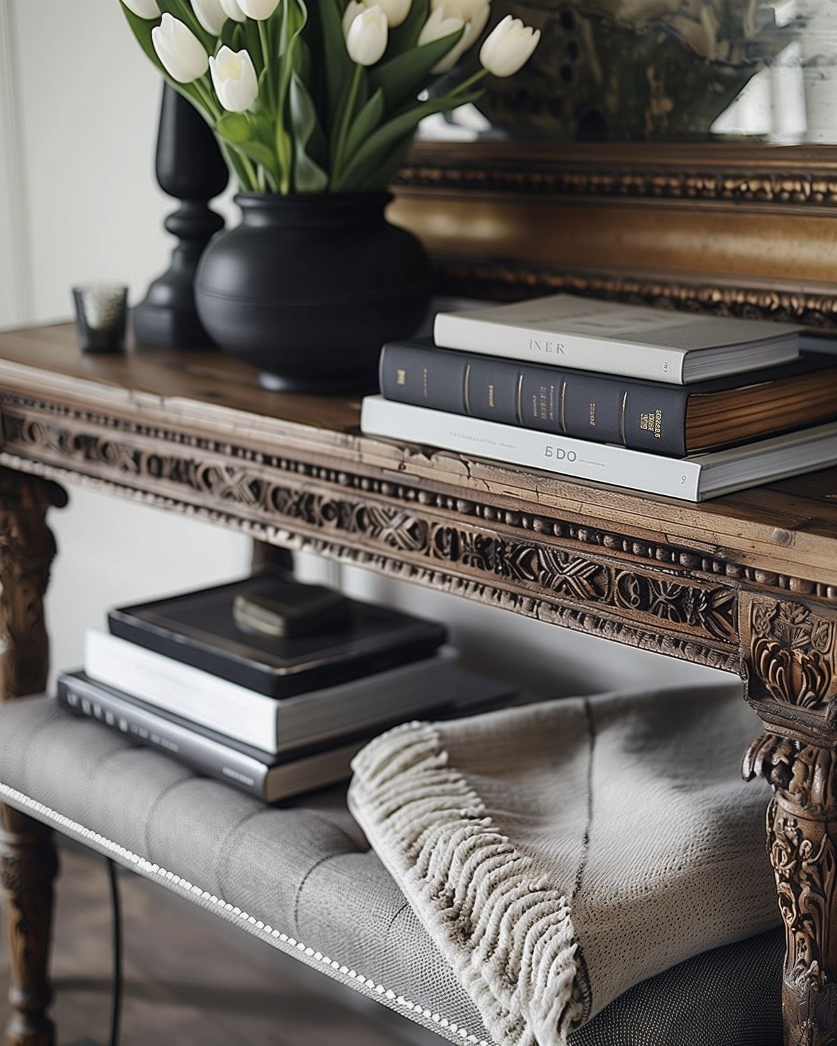 Console table with framed art and decor