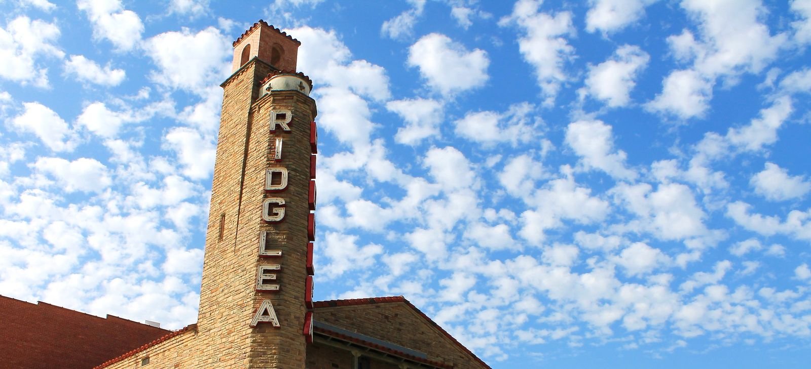 The Ridglea Theater tower and its vertical RIDGLEA sign on Camp Bowie Boulevard West in Fort Worth